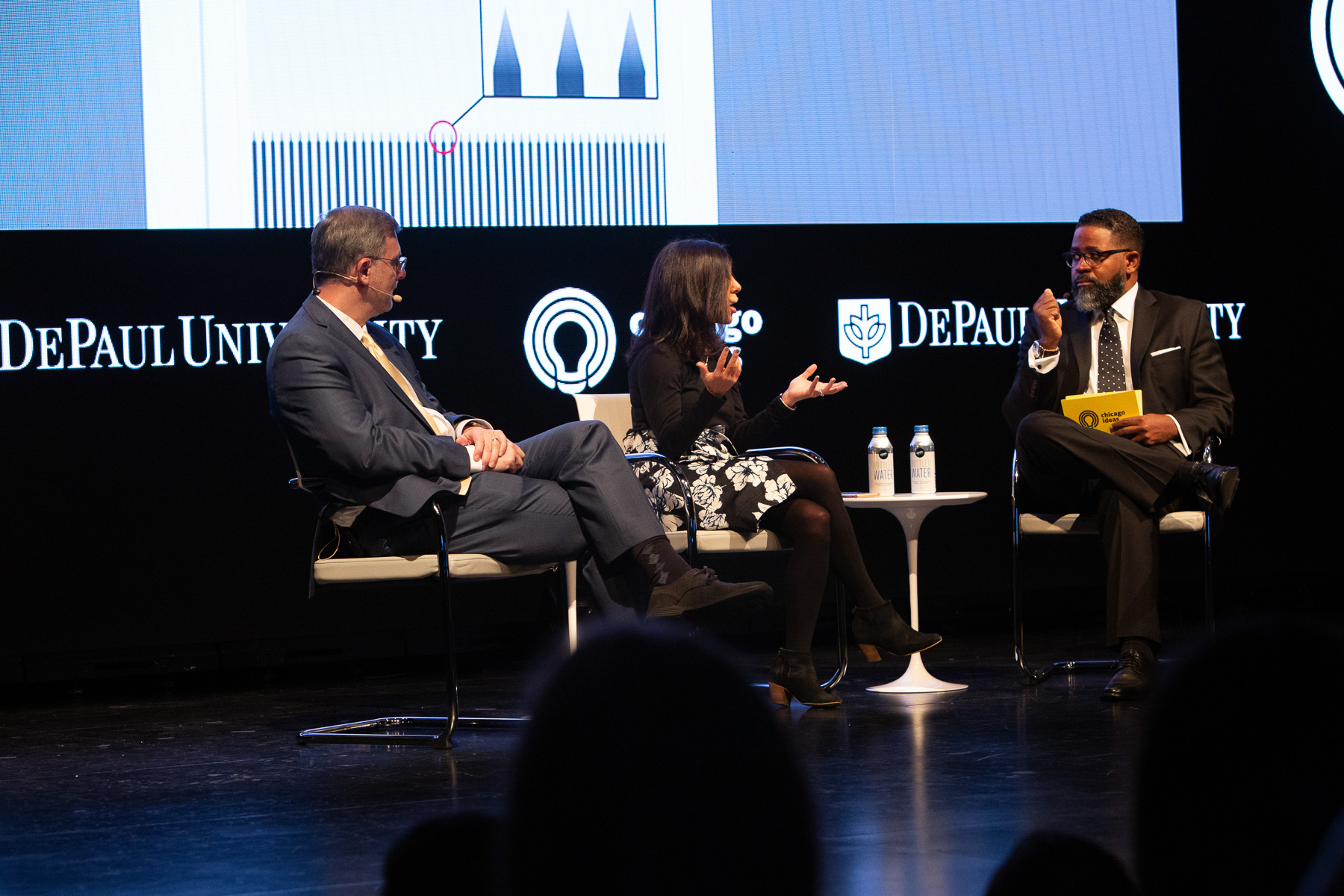 Michael Shear (left), White House correspondent for The New York Times; Julie Hirschfield Davis, congressional editor for The New York Times; and Jamil Smith, senior writer for Rolling Stone, speak during the Chicago Ideas Week panel "Are Borders Really the Problem?" (DePaul University/Randall Spriggs)